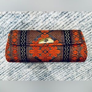 Vintage Orange Black Gold Handheld Clutch with gold-toned metal closure